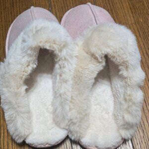 Pink fuzzy slippers
